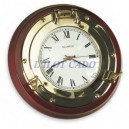 Horloge hublot en laiton poli sur base bois ronde