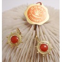 Pendentif Barre a roue Corail or﻿